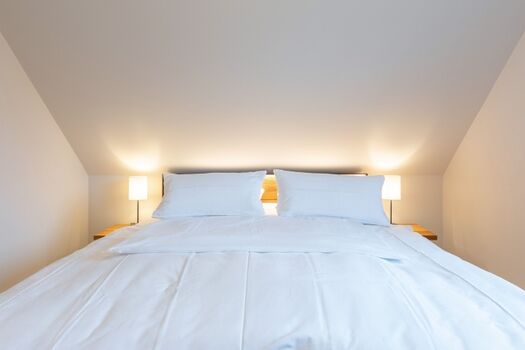 Biikehuus West - Zweites Schlafzimmer mit großem Doppelbett 