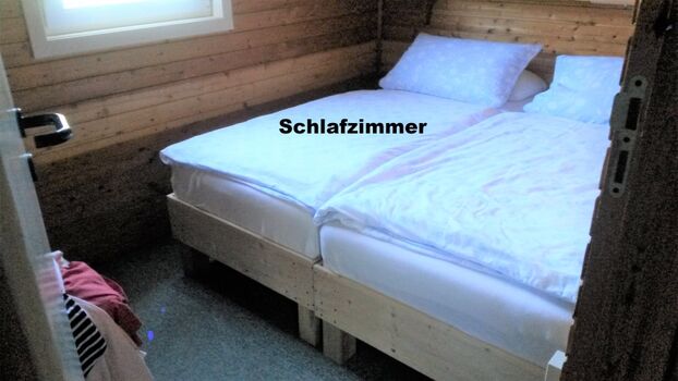 Schlafzimmer mit Doppelbett