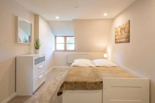 Dörpshus - Erstes Schlafzimmer mit ausziehbarem Kojenbett 