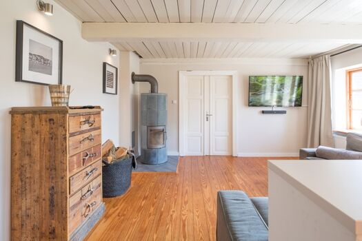 Dörpshus - Gemütlicher Wohnbereich mit Kamin