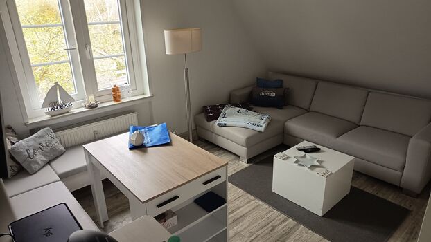 Ledersofa mit Ottomane