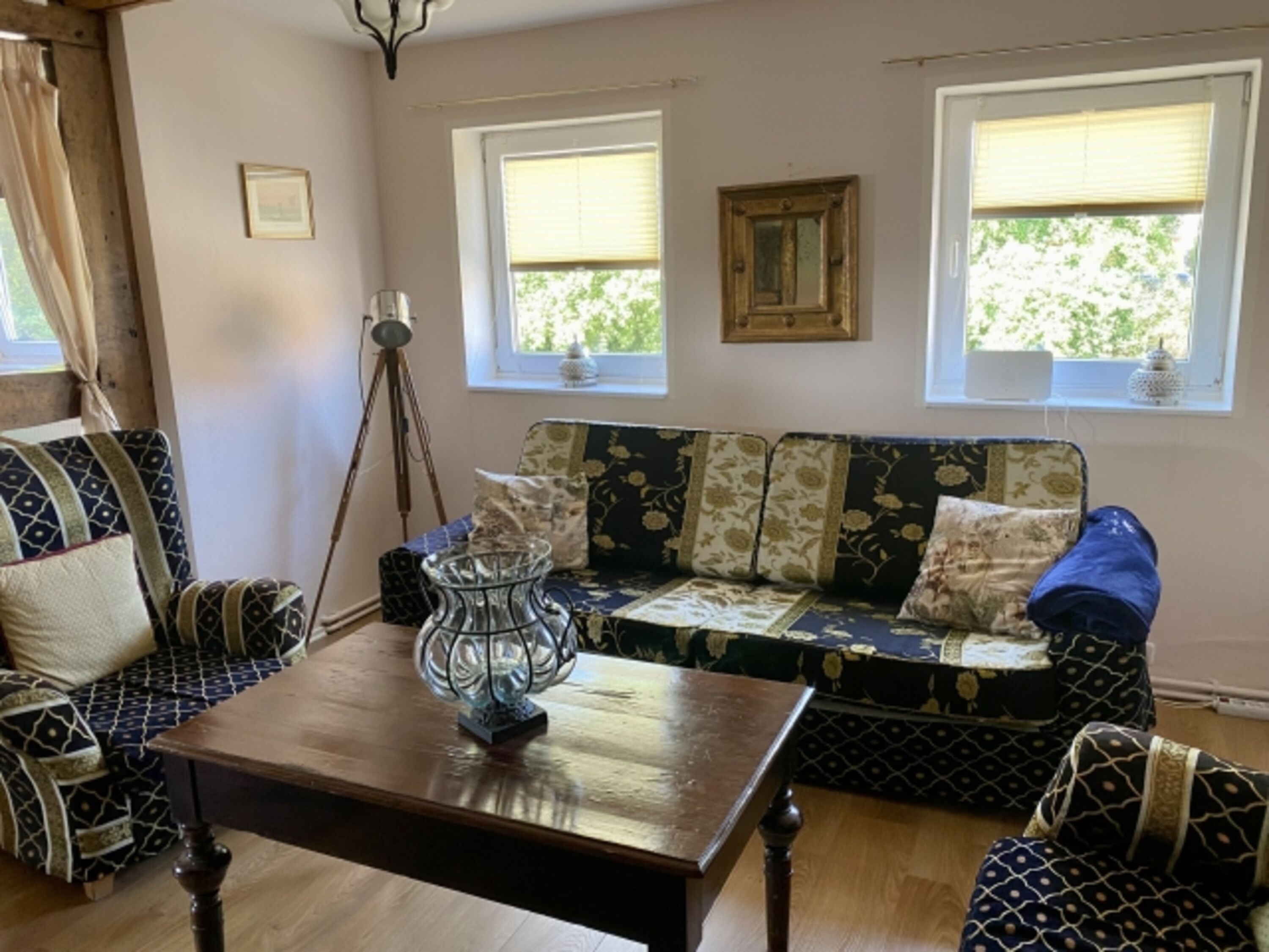 Wohnzimmer mit Schlafcouch 1 te Etage