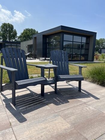 Unser Chalet Seestern mit eigener Sonneninsel vorne am Ufer...