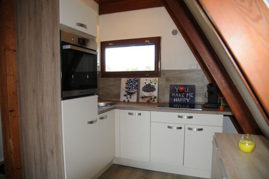 Die komplett ausgestattete Küche