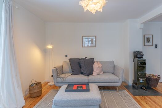 Mien Lütten - Gemütlicher Wohnbereich mit urigem Kamin 