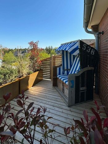 TIDE4 Ferienwohnung Amrum Apartment 2 Terrasse mit Strandkorb
