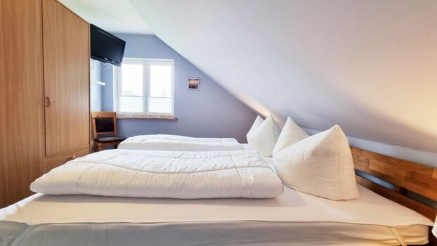 Das Doppelbettzimmer im  Obergeschoss