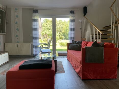 Wohnzimmer mit Terrasse