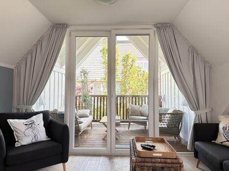 Wohnzimmer im OG mit Smart TV 