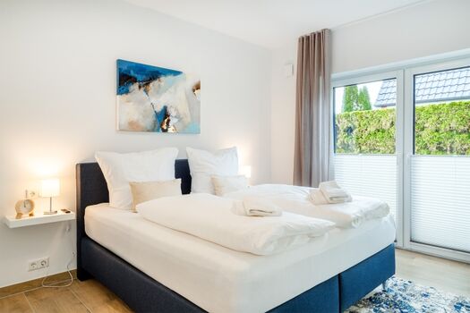 zweites Schlafzimmer mit Boxspringbett