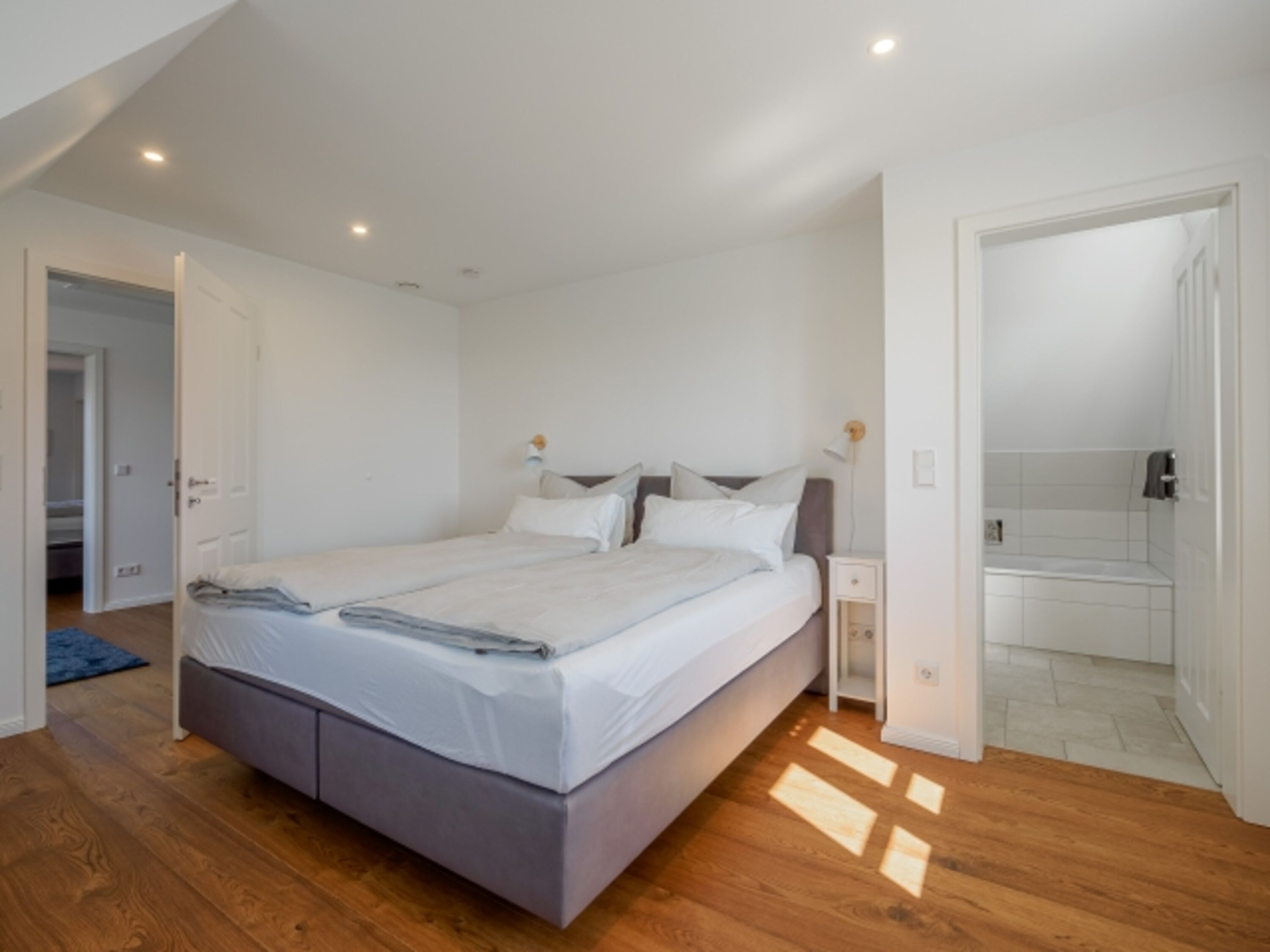 Schlafzimmer OG mit Bad en Suite