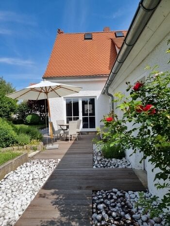Ferienhaus Rosengarten  mit eingezäuntem eigenen Garten