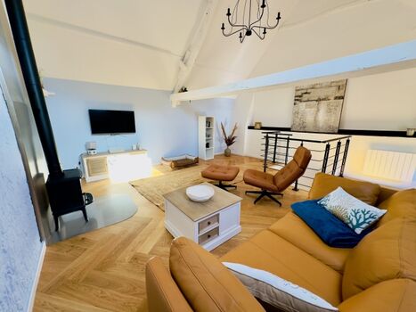 Wohnzimmer im OG mit Kamin