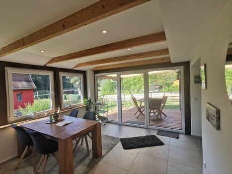 Wintergarten mit überdachter Terrasse