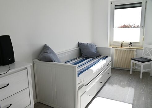 Schlafzimmer mit Ausziebett