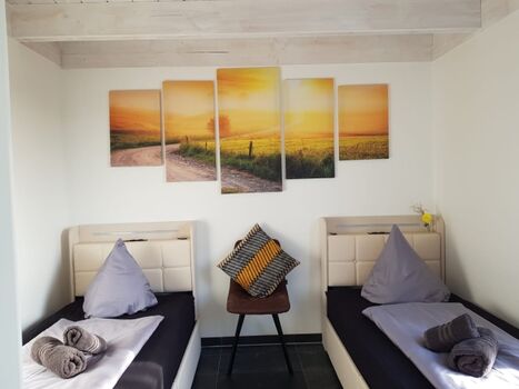 Schlafzimmer 1 im EG