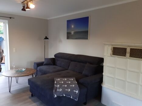 Sofa zum Entspannen mit Kachelofen 