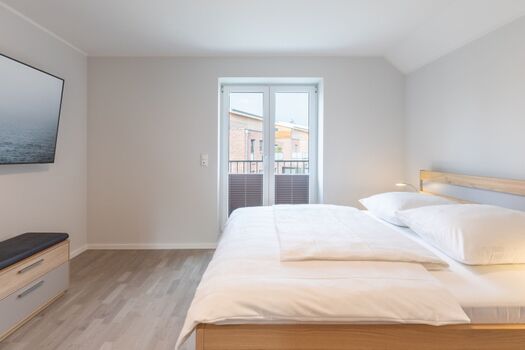 Westwind - Hauptschlafzimmer mit großem Doppelbett