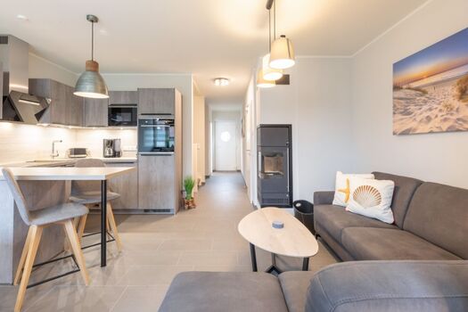 Westwind -  Heller Wohn und Essbereich mit Kamin 