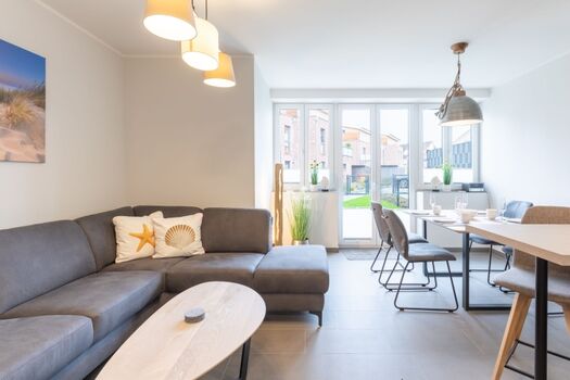 Westwind - Großer Wohn und Essbereich mit Blick in den Garten 