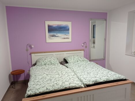 Schlafzimmer mit Doppelbett