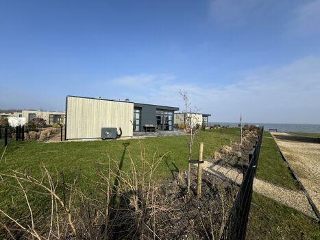 Chalet Strandpanorama mit Zaun am IJsselmeer