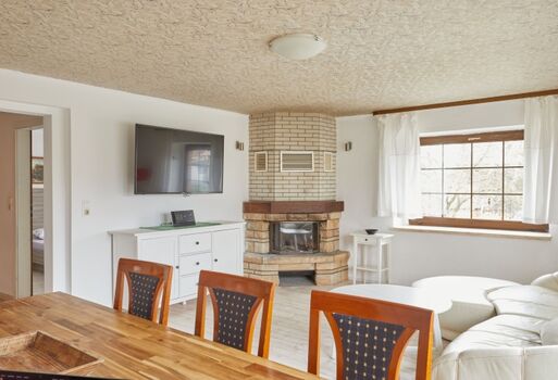 Wohnzimmer mit Kamin