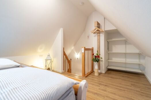 offenes Schlafzimmer im Dachgeschoss
