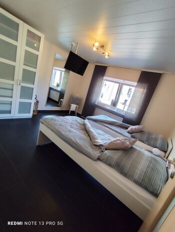 Schlafzimmer Links mit zwei Einzelbetten