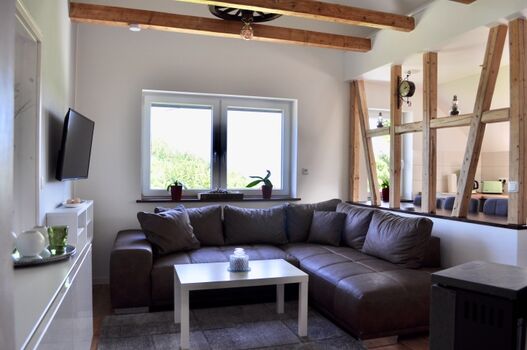 Wohnzimmer obere Wohnung