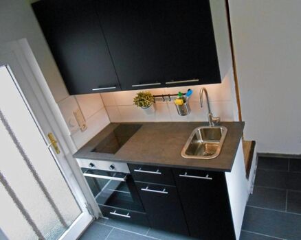 Wohnzimmer mit Küchenzeile