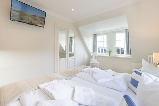 Schlafzimmer eins im 1 OG mit Bad en Suite