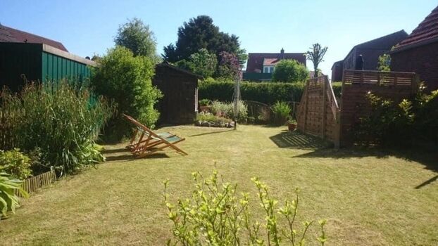 eingezäunter Garten mit Zugang zum Haus