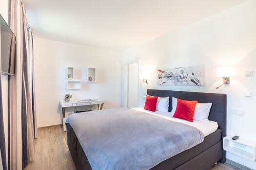 Schlafzimmer mit Badezimmer en Suite