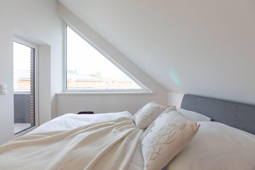 Kleine Krabbe - Schlafzimmer mit komfortablem Doppelbett (180x200cm)