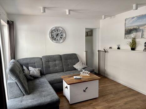 Wohnzimmer mit Schlafsofa