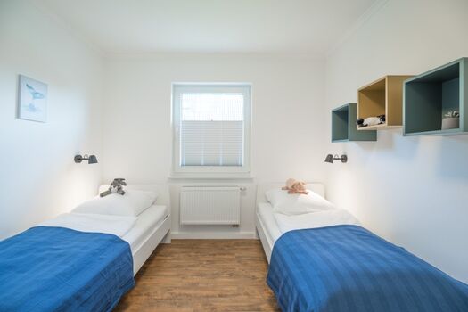 Eines der drei Schalfzimmer