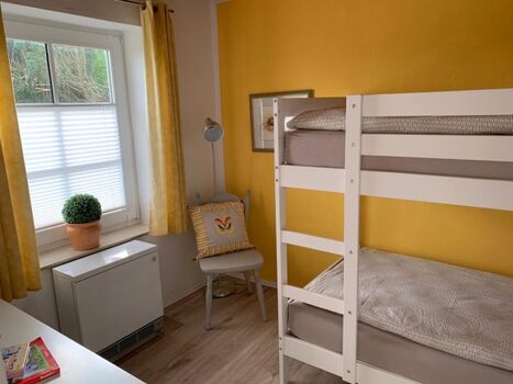 Das zweite Schlafzimmer mit Etagenbett.