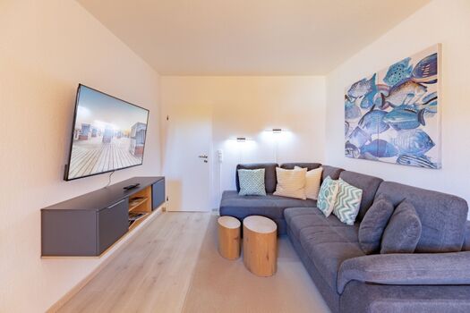 Sandloper - Gemütliche Sofaecke lädt zum Verweilen ein 