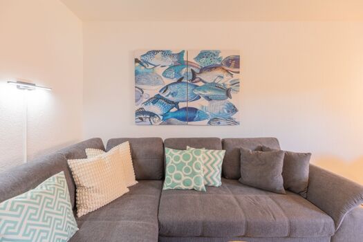 Sandloper - Gemütliche Sofaecke lädt zum Verweilen ein 