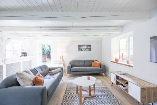 Offener Wohnraum in friesischem Stil