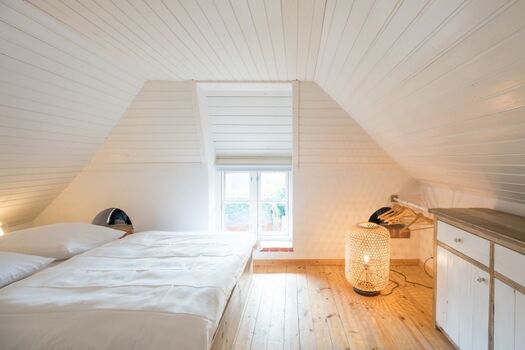 Schlafzimmer mit Doppelbett