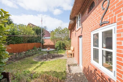 Gartenbereich zum Entspannen mit Hunden