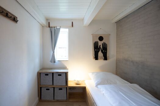 Schlafzimmer mit einem Einzelbett