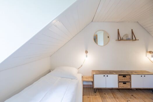 Schlafzimmer mit zwei Einzelbetten