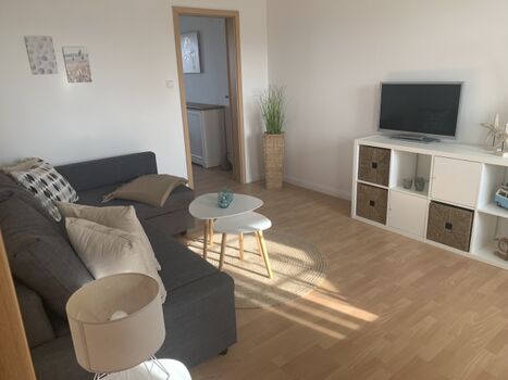 Der helle Wohnbereich von Bude 6.