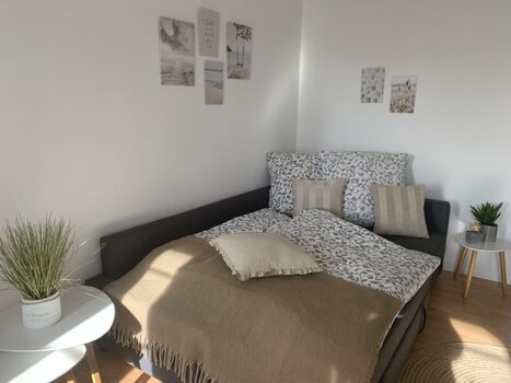 Das Sofa kann als Schlafcouch genutzt werden (extra Topper).