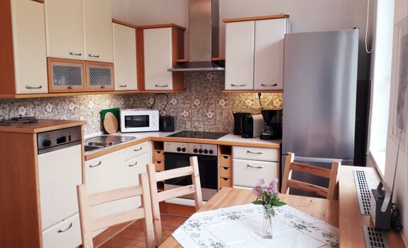 Eine voll ausgestattete Küche erwartet sie