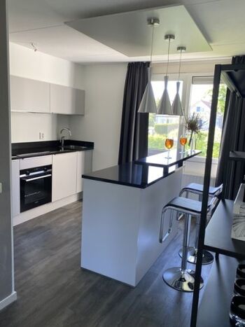 Offene Küche lädt zum kochen und verweilen ein