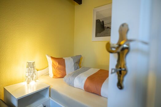 Schlafzimmer 2 mit den beiden Einzelbetten